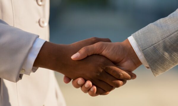 Shaking hands over a real estate deal in Ghana